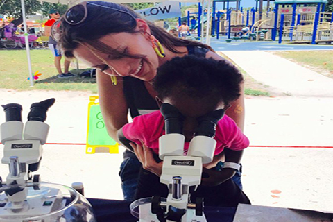 Christina Pasparakis volunteering at a science outreach event